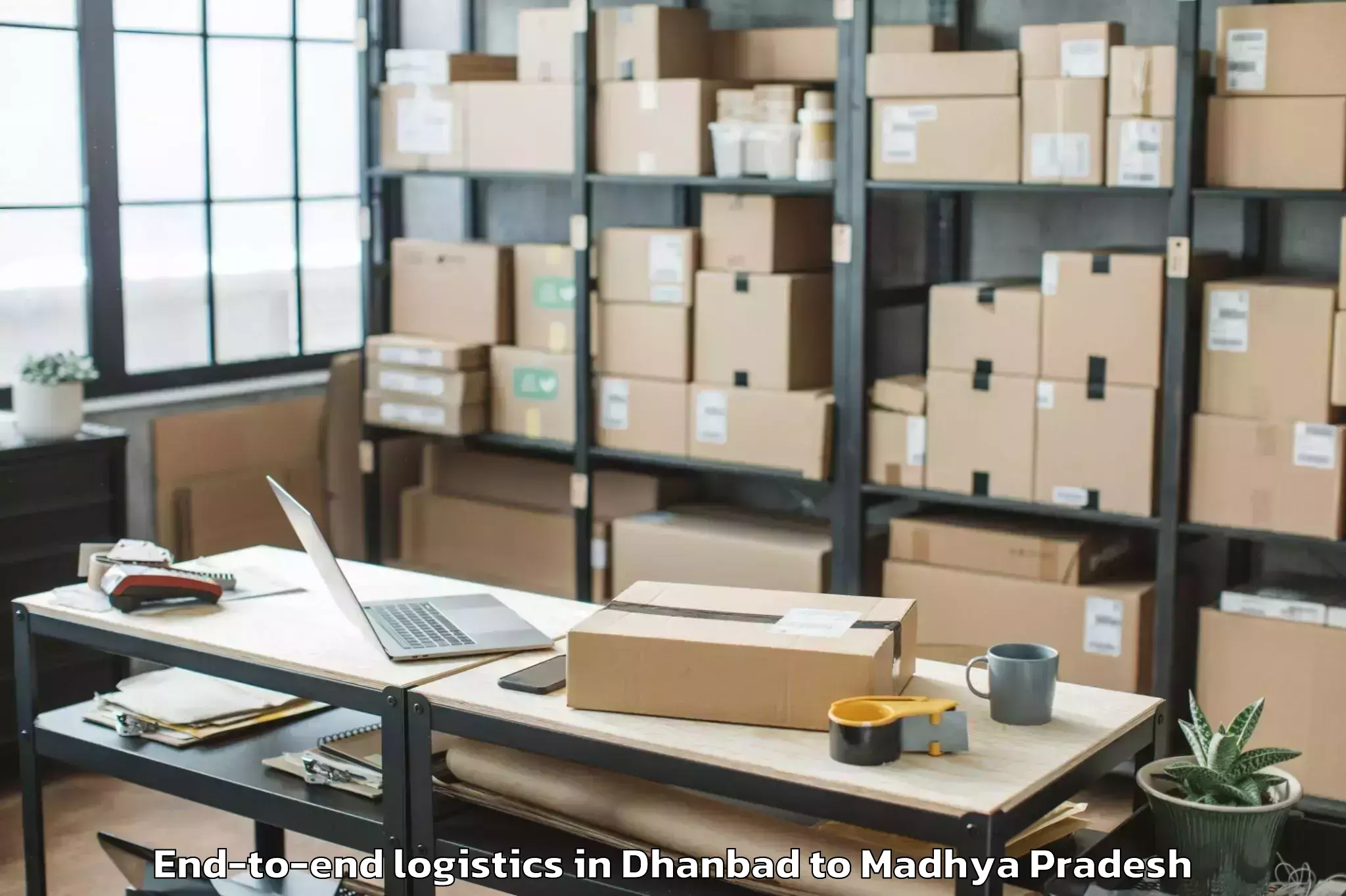 Easy Dhanbad to Saugor End To End Logistics Booking